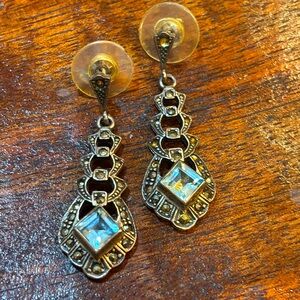 Blue sapphire dangling silver (925) earrings.